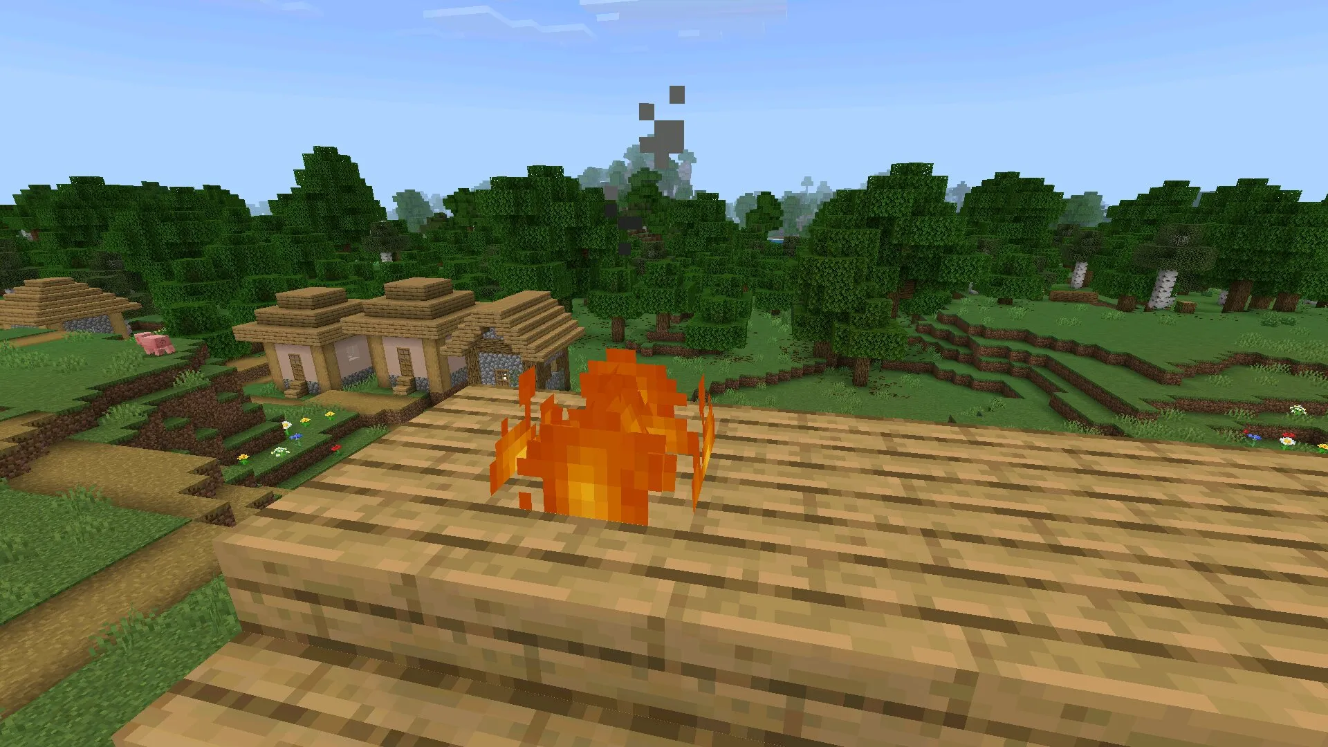 На крыше дома из текстур пака на маленький огонь в Майнкрафт ПЕ