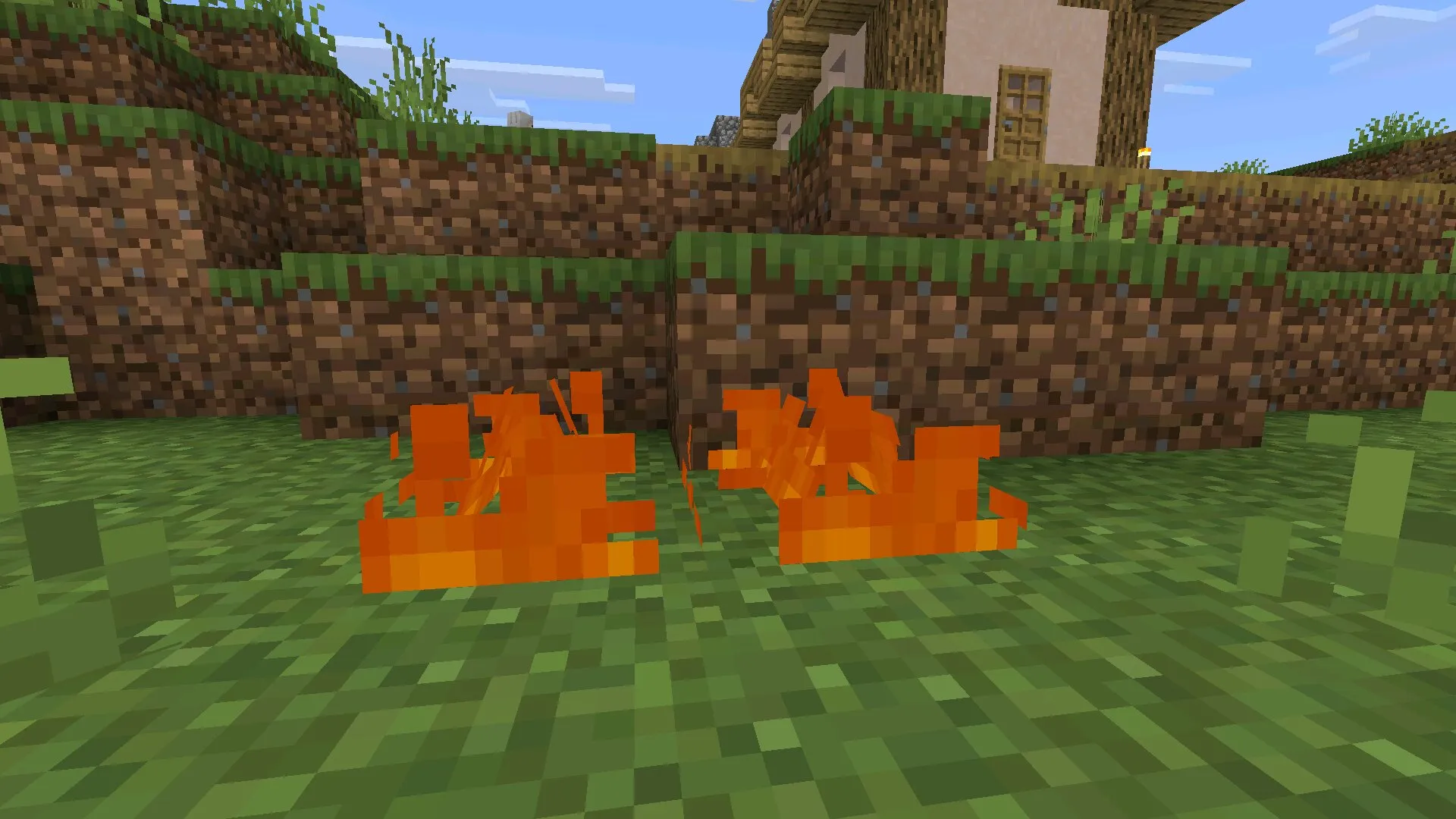 На траве из текстур пака на маленький огонь в Майнкрафт ПЕ